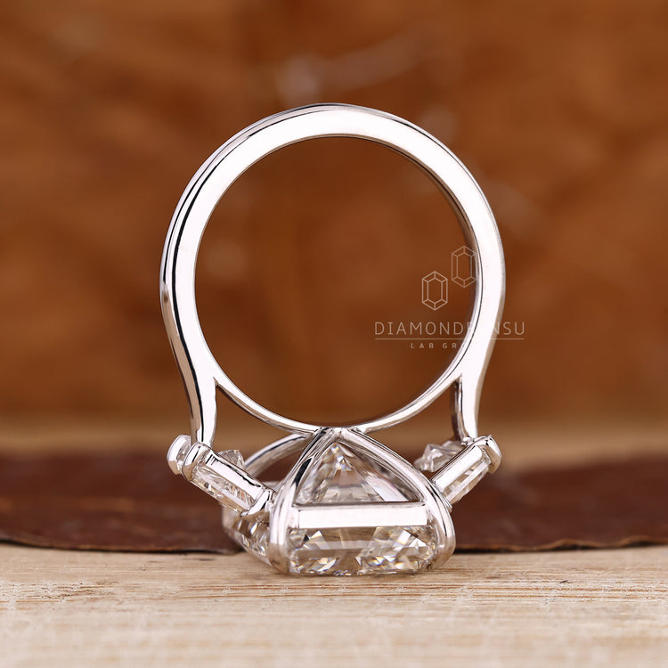 Custom engagement ring available in every metal with radiant cut diamond.