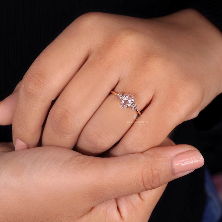 IGI certified ring with pear rose cut diamond.
