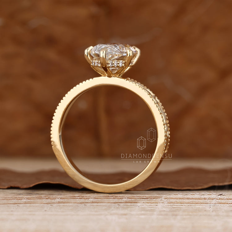 Dutch marquise diamond ring round halo accents.