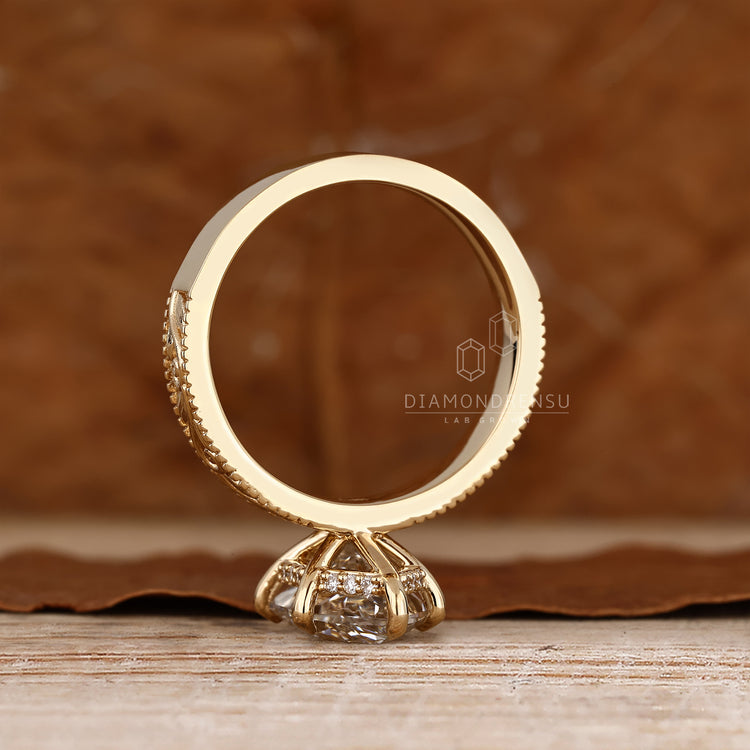 Dutch marquise diamond ring hidden halo setting.
