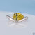 Pear diamond ring in east to west setting with solitaire style.
