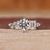 Round cut diamond ring with six tab prong setting.
