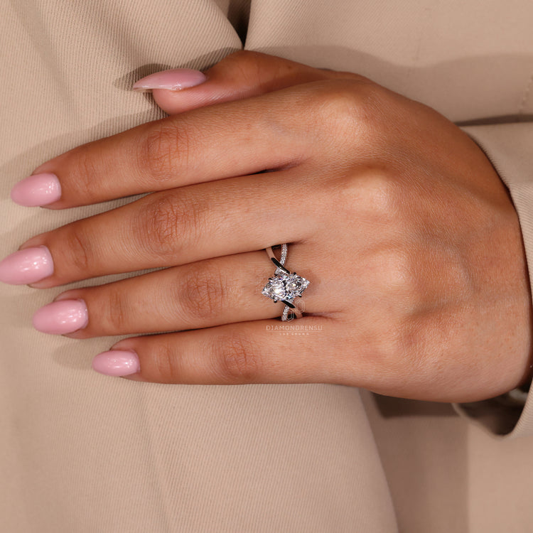 IGI certified engagement ring with marquise diamond and pavé accents.
