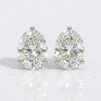 4 TCW Oval Cut Martini Prong Moissanite Stud Earrings - 14k White Gold