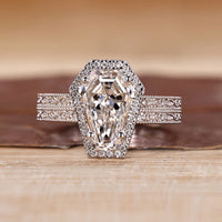 Coffin cut diamond ring double pave halo art deco.
