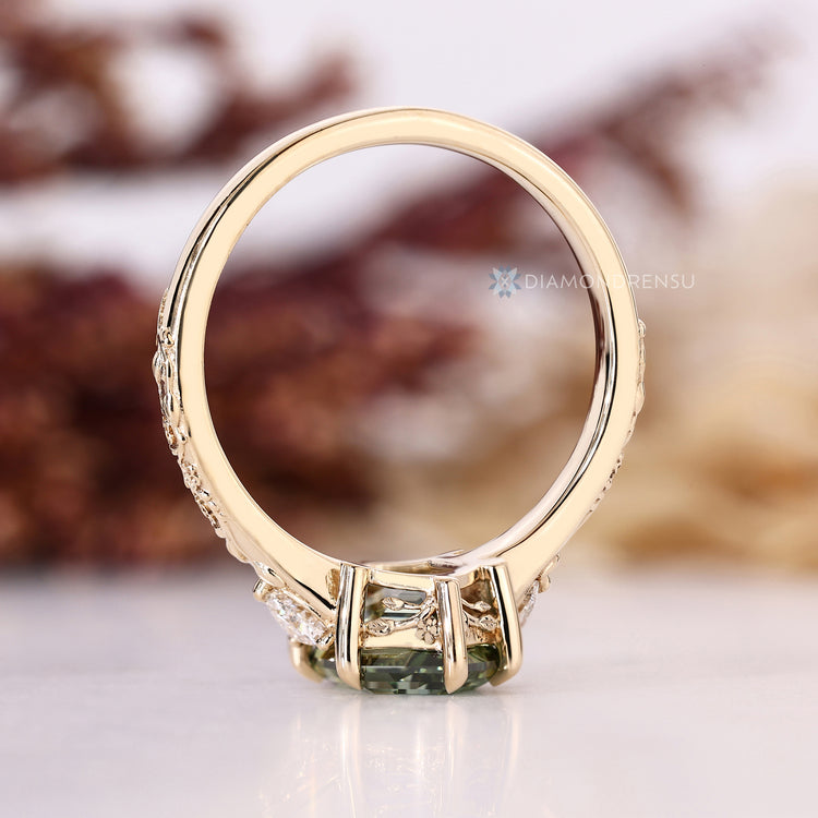 Hexagon diamond ring with six claw prongs.