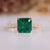 Asscher emerald ring art deco milgrain tapered shank.
