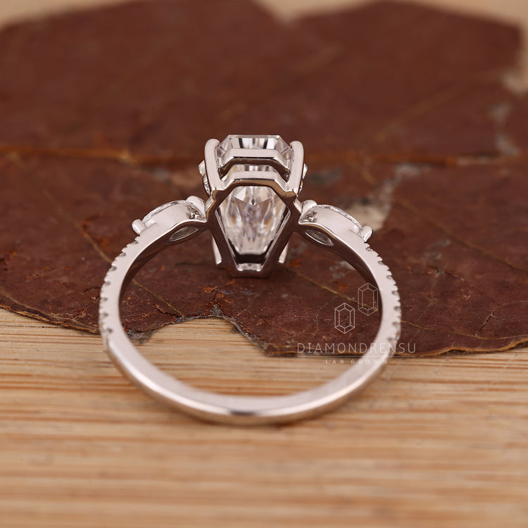IGI certified coffin diamond ring four prong set.