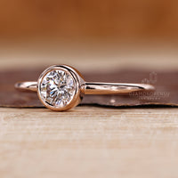 Diamondrensu AU handmade bezel set solitaire ring.

