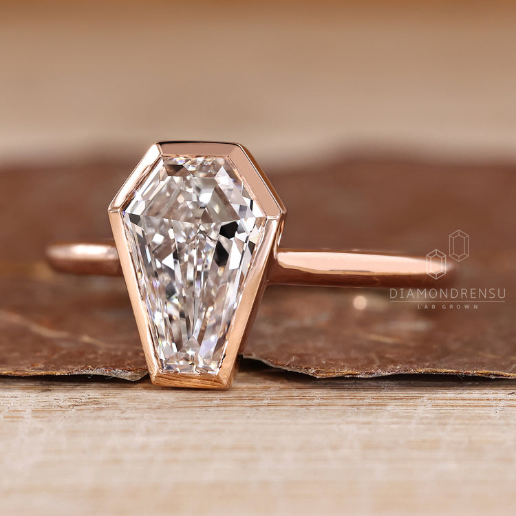 Lab grown coffin diamond ring solitaire style.