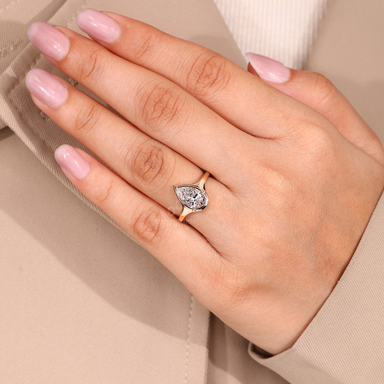 Pear cut diamond ring IGI certified solitaire.
