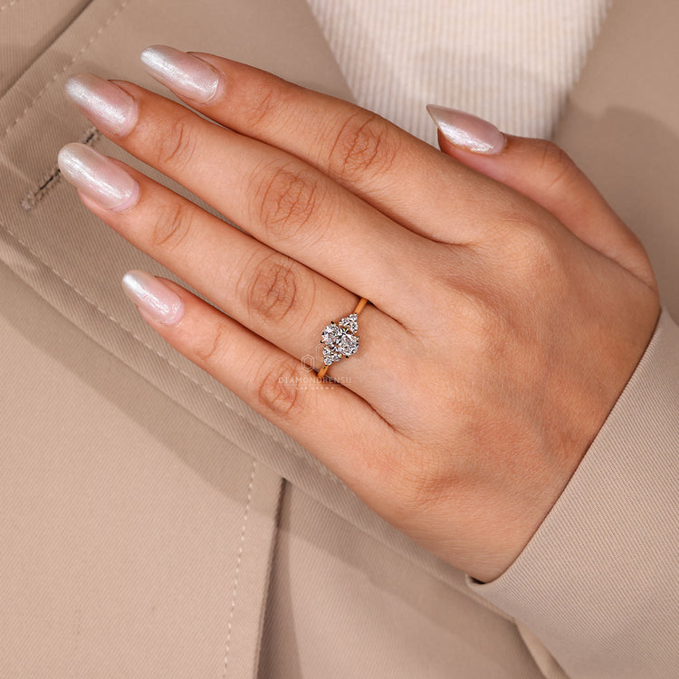 Oval cut diamond ring cathedral four claw prong set.
