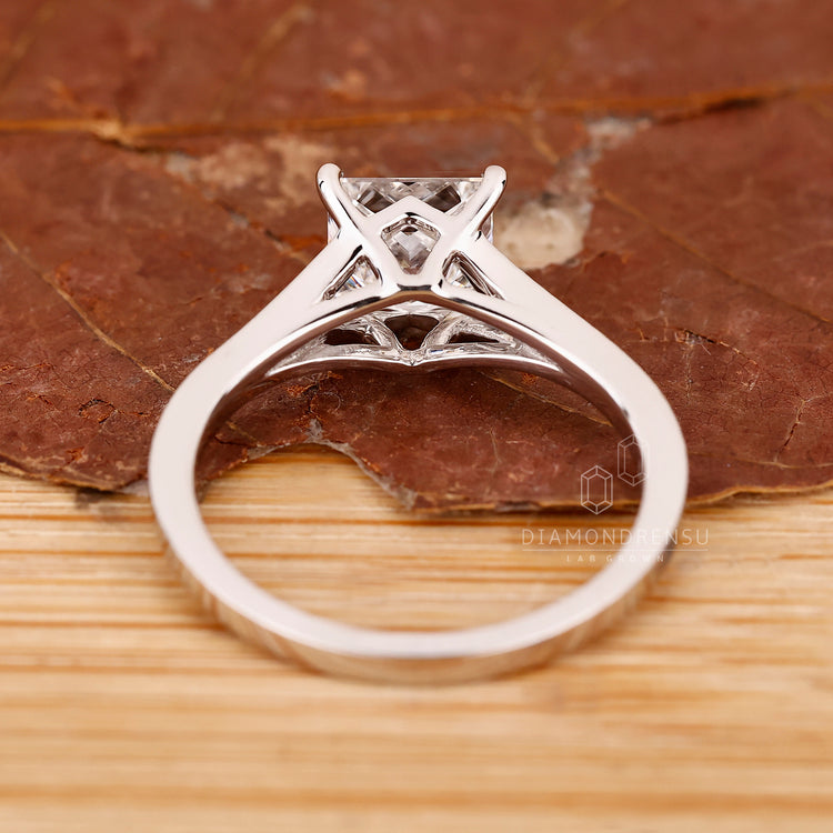 IGI certified princess diamond ring cathedral setting.
