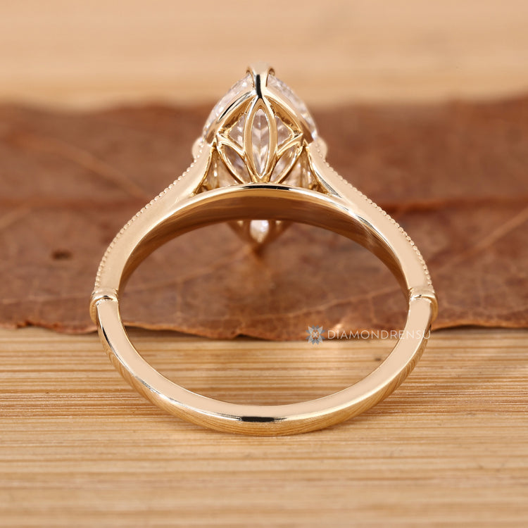 Marquise diamond ring with Art Deco inspired setting.