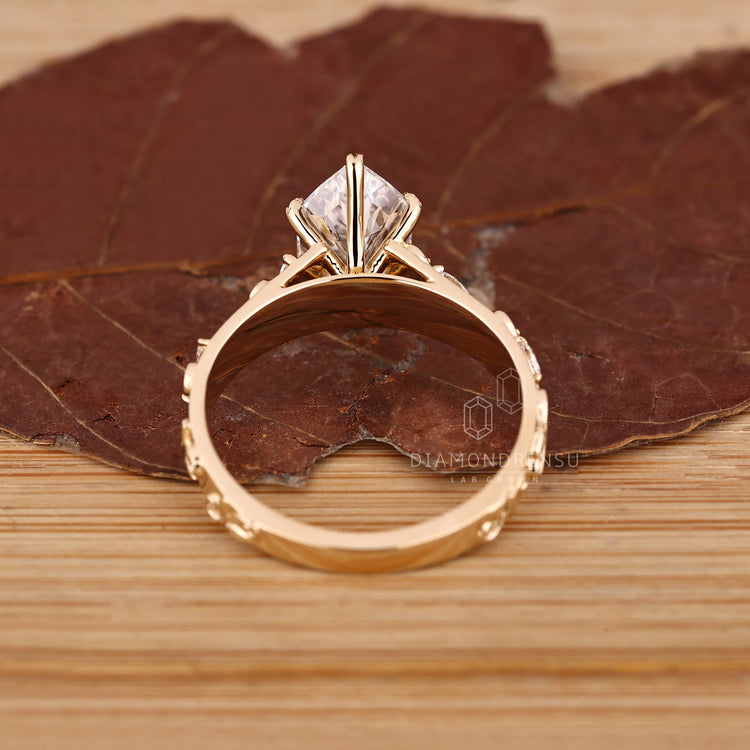 Nature inspired art deco marquise ring.

