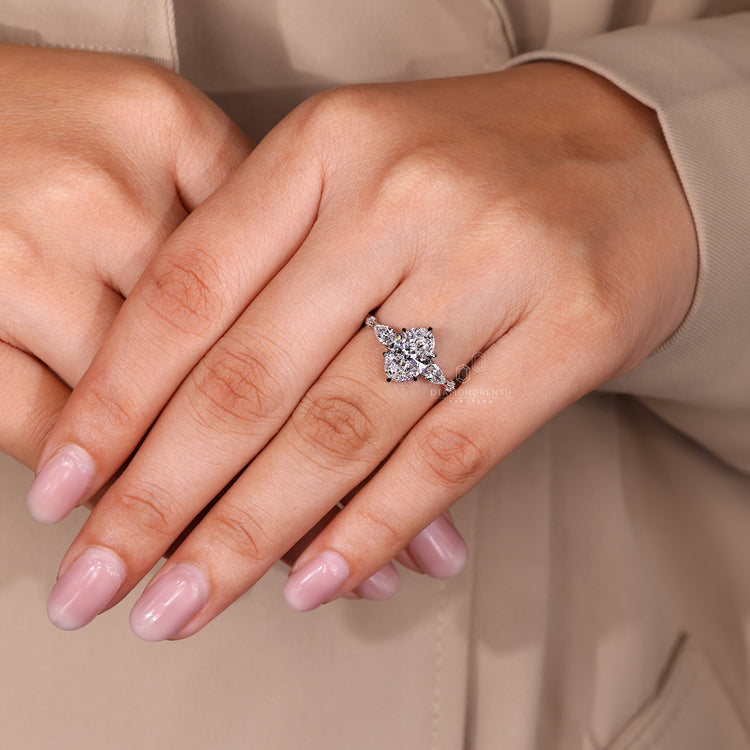 Oval cut diamond ring with six claw prong style.
