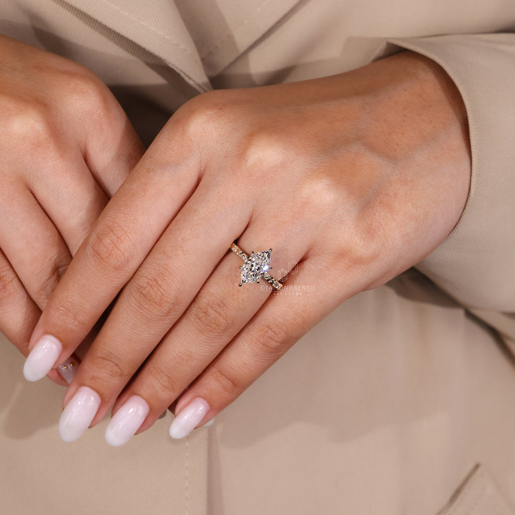 Dutch marquise diamond ring sunflower solitaire style.
