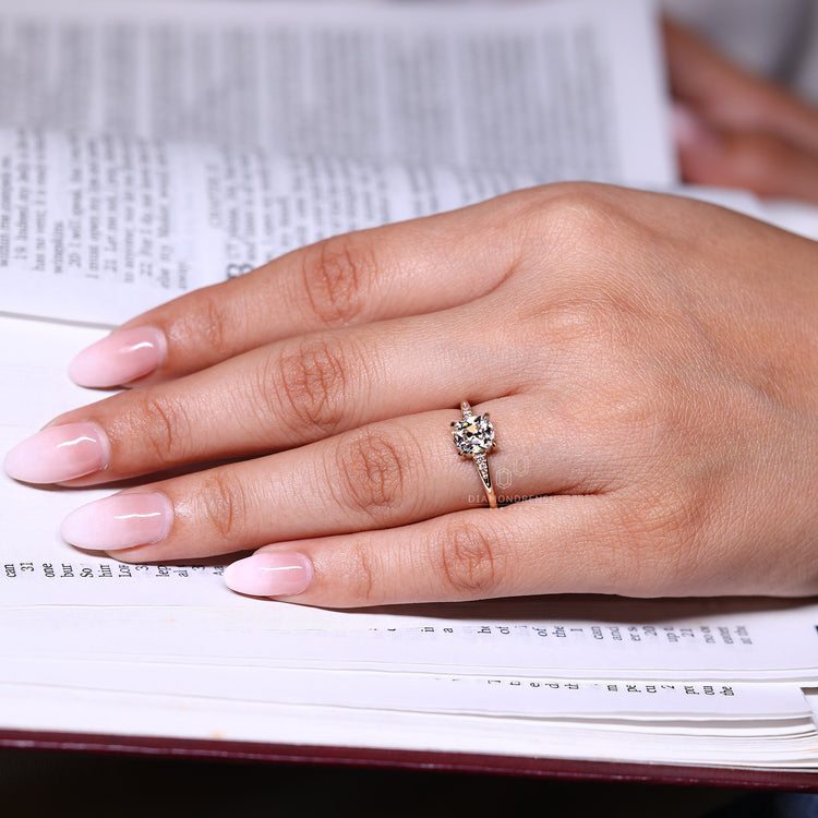 Handmade Cushion Old European Cut seven stone diamond ring.
