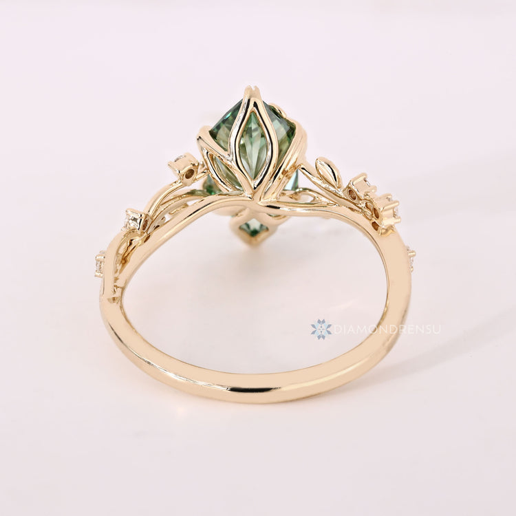 Dutch marquise diamond ring with leaf prong setting.