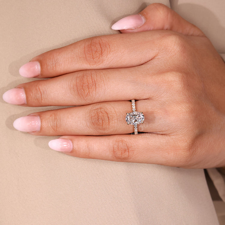Oval cut diamond ring IGI certified hidden halo.
