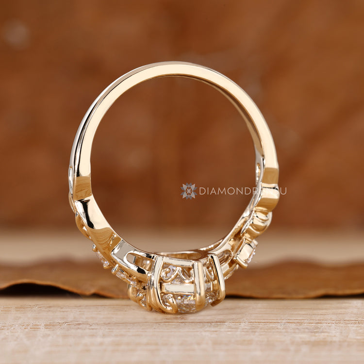 Nature inspired marquise ring with flower bud design.