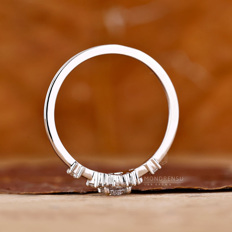 Round diamond ring halo cluster four prong set.
