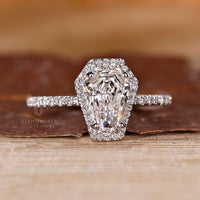Halo pave coffin diamond ring four prong set.
