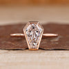 Coffin cut diamond ring bezel cathedral solitaire.