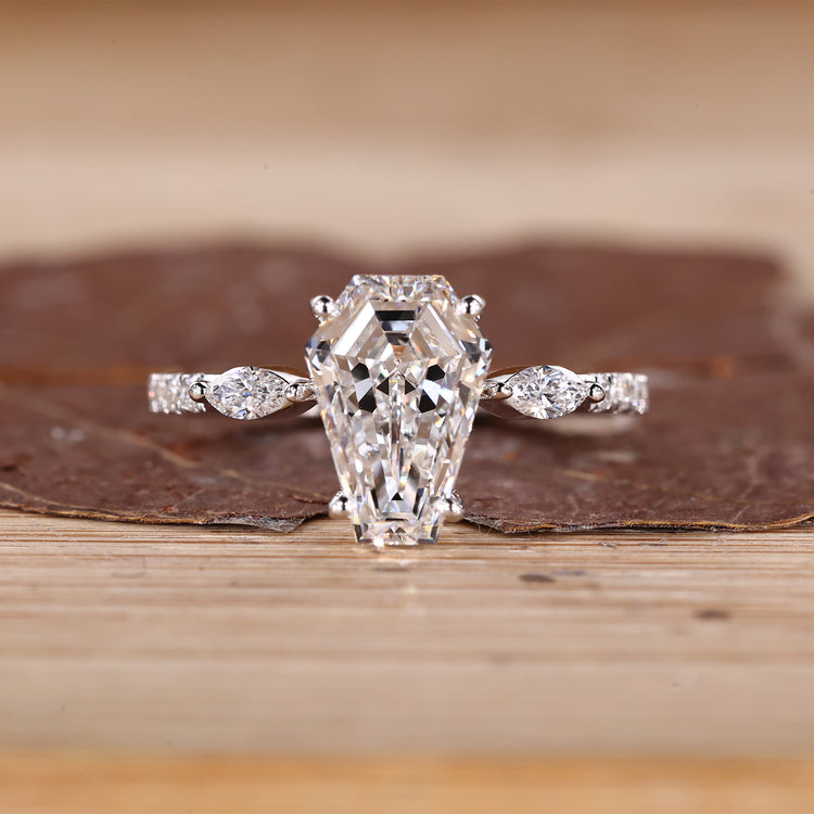Coffin cut diamond ring marquise side stones pave.