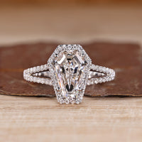 Coffin cut diamond ring halo split shank style.