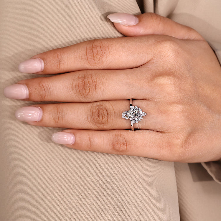 Coffin cut ring vintage halo setting design.