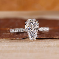 Pave band coffin diamond ring cathedral pinch shank.
