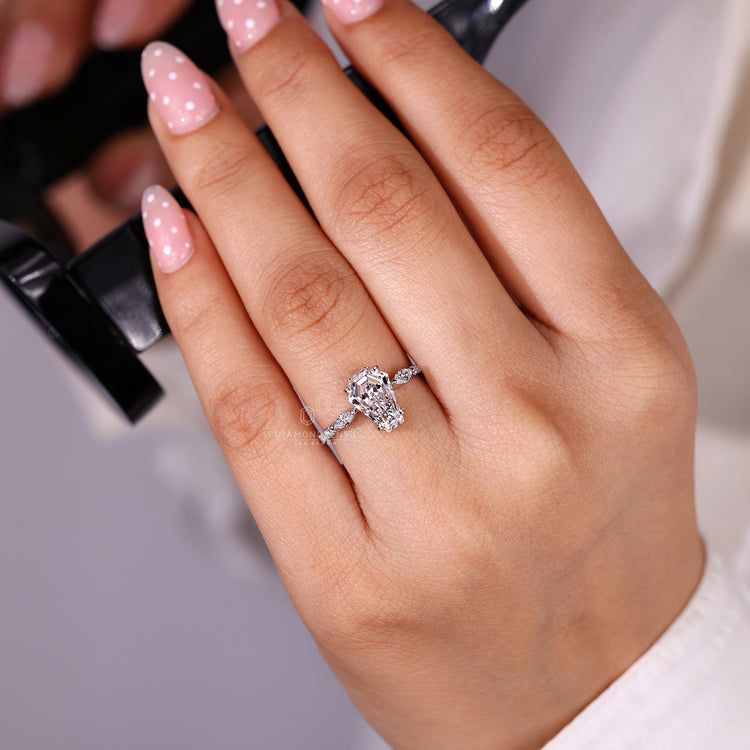 Coffin cut ring four prong pave style set.