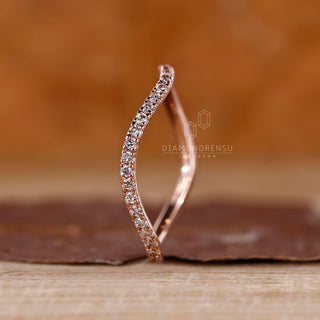 Round cut diamond band half eternity ocean wave style.
