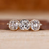 Cushion Old European Cut Ring three stone style design.
