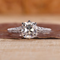 Cushion Old Mine Cut Ring two sided pave design.