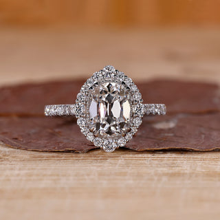 Cushion Old European Cut Ring halo pave style.
