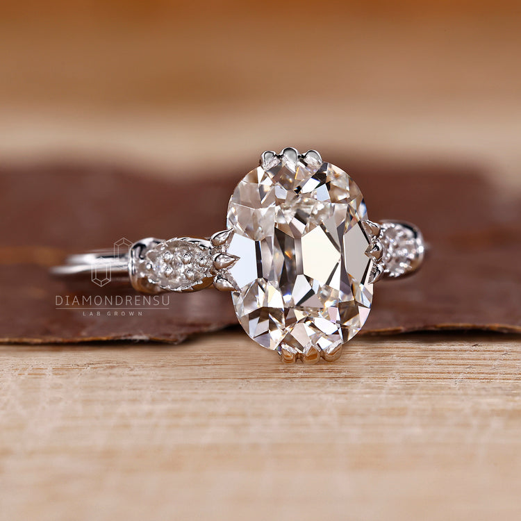 Handmade Cushion Old European Cut seven stone ring.
