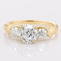 Round OEC Infinity Shank Three Stone Moissanite Engagement Ring