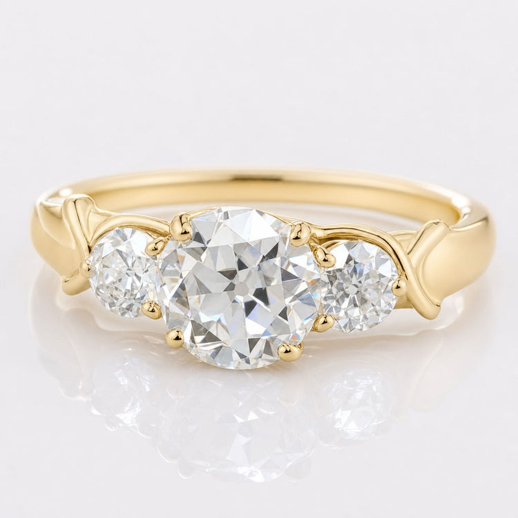 Round OEC Infinity Shank Three Stone Moissanite Engagement Ring