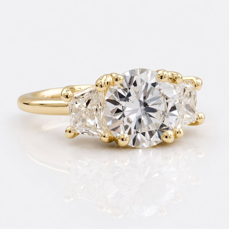 Round Trapezoid Three Stone Trellis Setting Moissanite Engagement Ring