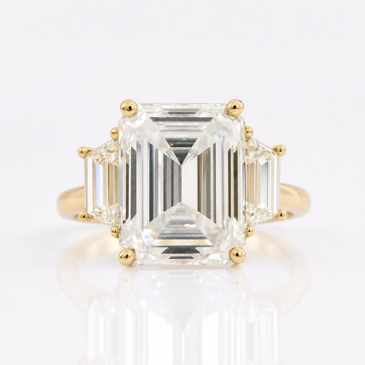 Trapezoid Emerald Step Cut Cathedral set Three Stone Engagement Ring
