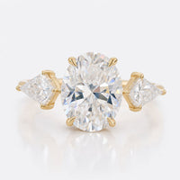 2.34 TCW Oval Kite Cut Moissanite Cathedral Set Three Stones Engagement Ring