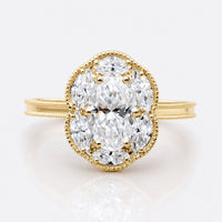 1.48 TCW Oval Cut Moissanite with Marquise Cluster Halo Engagement Ring