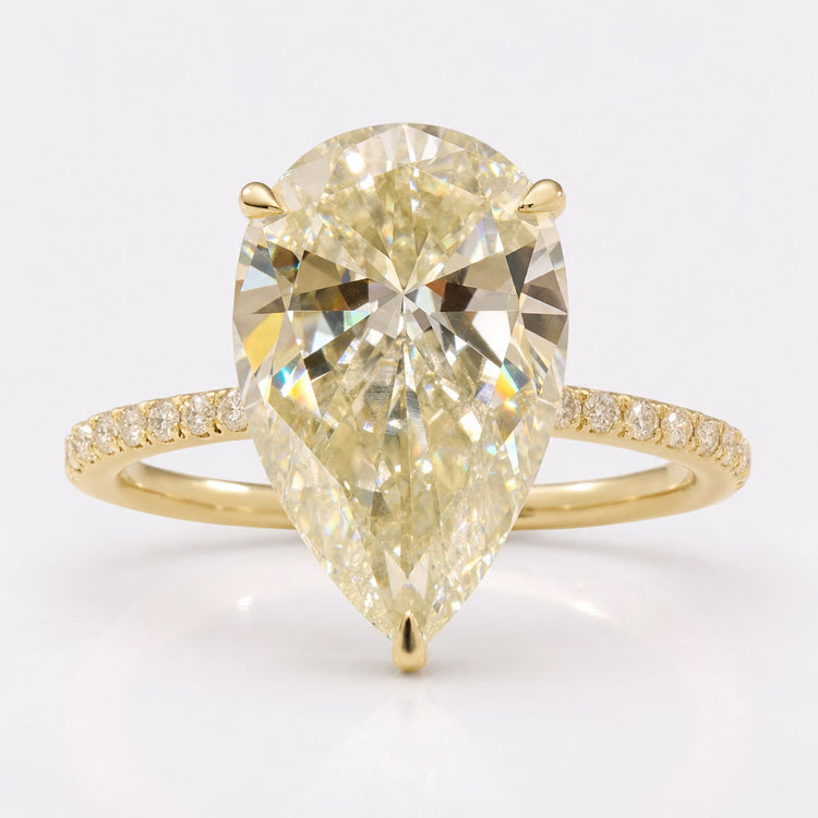 Unique 5.16 TCW Pear Cut Hidden Halo Pave Set Moissanite Engagement Ring