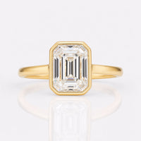 Emerald Cut Moissanite Bezel Set Contemporary Ring - 1.78 CT