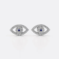 Evil eye lab-grown diamond stud earrings in 14k solid white gold with blue diamond centre