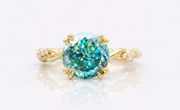 Antique style moissanite ring with ornate milgrain detailing in solid gold