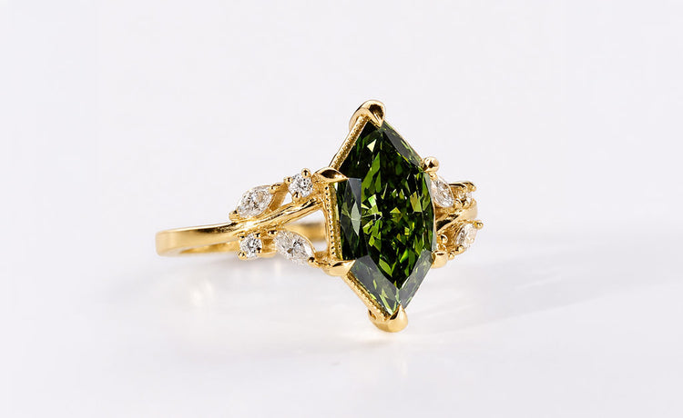 Antique cut coloured lab grown diamond ring with a tinted centre stone