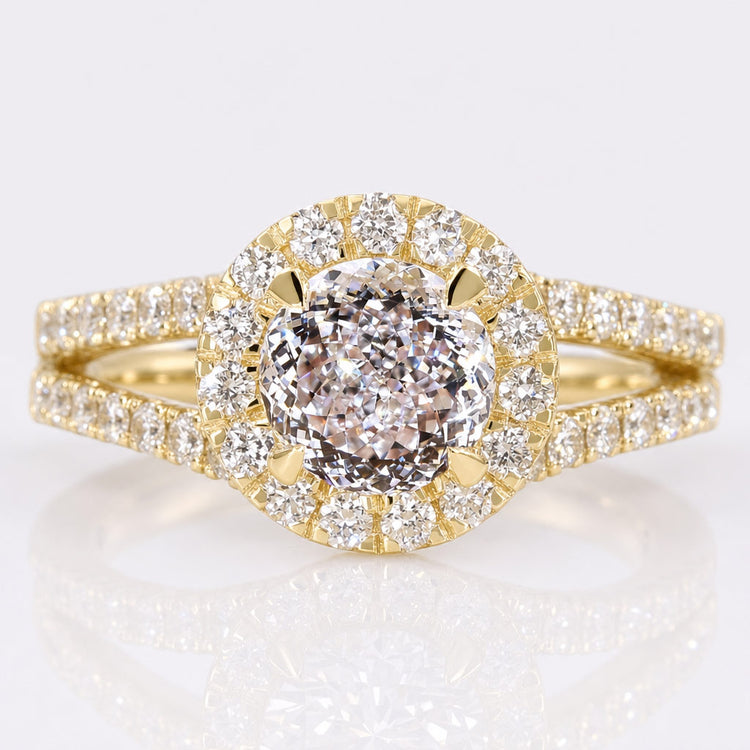 Antique cut lab grown diamond halo ring framed by pave set diamonds